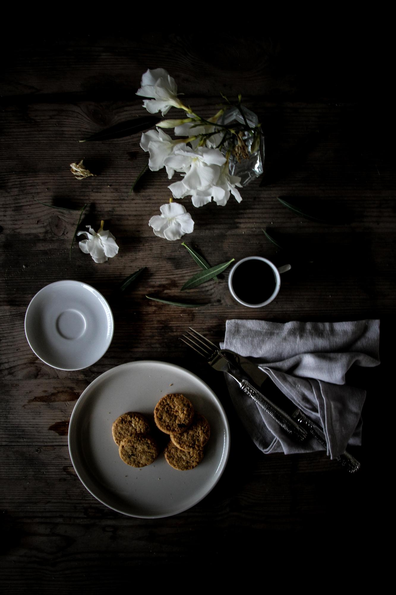 large editorial shot of plated degustation menu on dark table